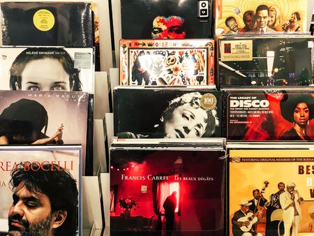 BUCHAREST, ROMANIA - MAY 06, 2017: Vinyl Record Cases Of Famous Music Bands For Sale In Music Store.