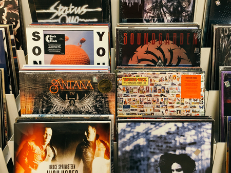 BUCHAREST, ROMANIA - MAY 06, 2017: Vinyl Record Cases Of Famous Music Bands For Sale In Music Store.のeditorial素材
