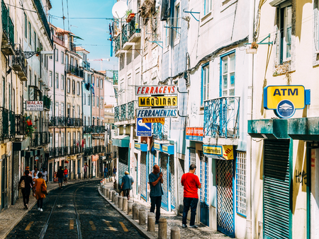 LISBON, PORTUGAL - AUGUST 12, 2017: Tourists Exploring The Old Streets Of Lisbon City in Portugal.のeditorial素材