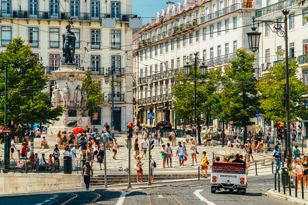 LISBON, PORTUGAL - AUGUST 12, 2017: Tourists exploring square of Luis de Camoes (Praca Luis de Camoes), one of the biggest squares in downtown Lisbon city in Portugal.のeditorial素材