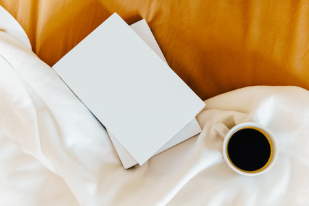 Relaxing With Coffee Cup And Good Books In Bed On Weekend