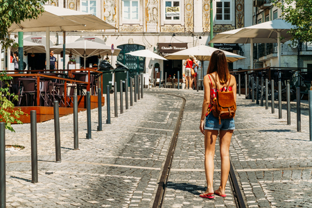LISBON, PORTUGAL - AUGUST 13, 2017: Tourists Walking Downtown Lisbon City In Portugalのeditorial素材