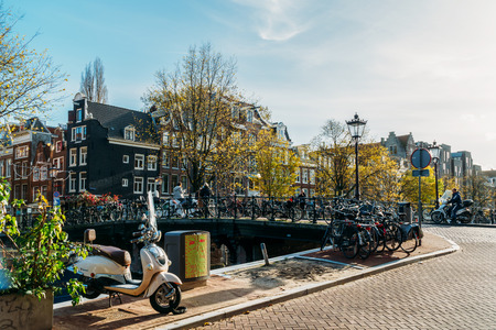 AMSTERDAM, NETHERLANDS - NOVEMBER 13, 2017: Beautiful Architecture Of Dutch Houses and Houseboats On Amsterdam Canal In Autumnのeditorial素材