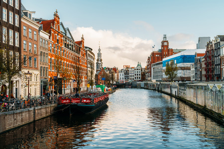 AMSTERDAM, NETHERLANDS - NOVEMBER 13, 2017: Beautiful Architecture Of Dutch Houses and Houseboats On Amsterdam Canal In Autumnのeditorial素材