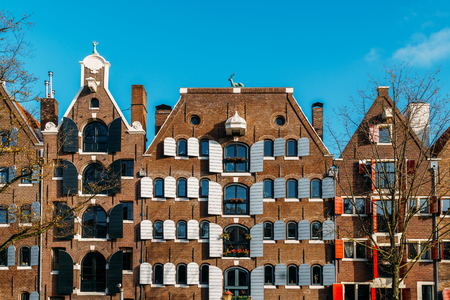 Beautiful Architecture Of Dutch Houses On Amsterdam Canal In Autumnのeditorial素材
