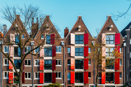 Beautiful Architecture Of Dutch Houses On Amsterdam Canal In Autumnのeditorial素材