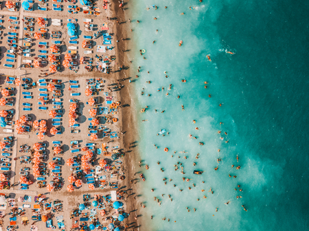 COSTINESTI, ROMANIA - JULY 16, 2018: Aerial Drone View Of People Crowd Having Fun And Relaxing On Costinesti Beach In Romaniaのeditorial素材