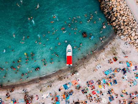 Aerial Drone View Of People Having Fun And Relaxing On Costinesti Beach In Romania At The Black Sea
