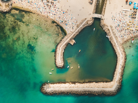 Aerial Drone View Of Concrete Pier On Turquoise Water At The Black Sea Resort Costinesti In Romaniaの写真素材