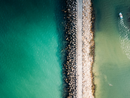 Aerial Drone View Of Concrete Pier On Turquoise Water At The Black Seaの写真素材