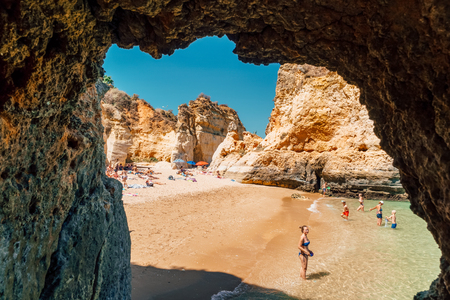 LAGOS, PORTUGAL - AUGUST 31, 2017: People Having Fun In Water And Relaxing In Lagos Ocean Beach Of Portugalのeditorial素材