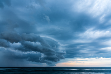 Storm Clouds Gathering Over Oceanの写真素材
