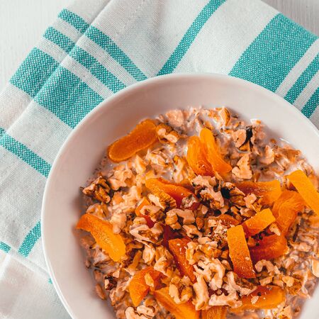 Spiced Apricot And Walnuts Porridge With Oatsの写真素材