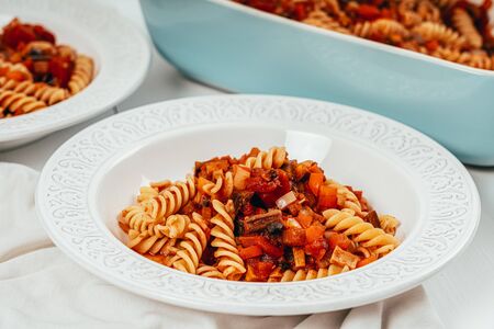 Traybake Fusilli Pasta With Aubergine, Peppers, Tomatoes And Mushroomsの写真素材