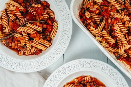 Traybake Fusilli Pasta With Aubergine, Peppers, Tomatoes And Mushroomsの写真素材