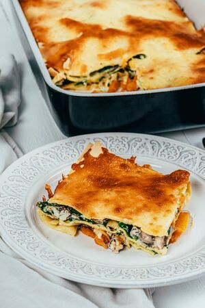Lasagna Tray Bake With Butternut Squash, Spinach, Ricotta Cheese And Mozzarellaの写真素材