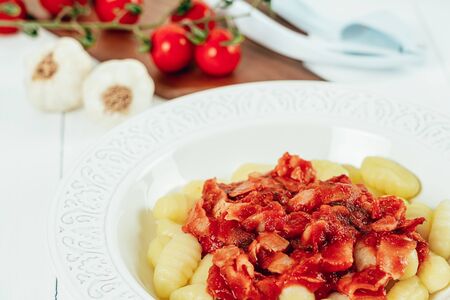 Bacon And Tomato Gnocchi Pastaの写真素材