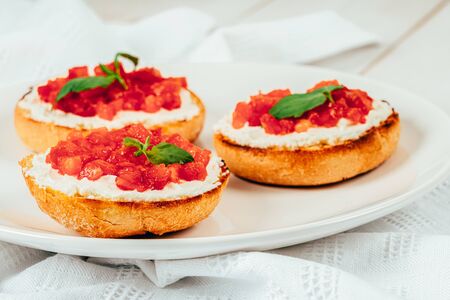 Tomatoes And Goat Cheese Bruschettiの写真素材