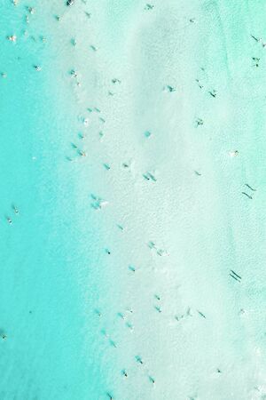 Aerial Photography Of Turquoise Ocean Water And People Crowd In Summerの写真素材
