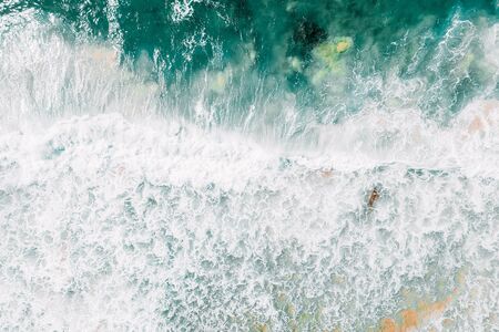 Blue Ocean Waves And Beautiful Sandy Beach Shore in Portugalの写真素材
