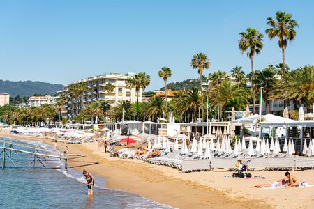 CANNES, FRANCE - JUNE 01, 2019: People Having Fun On Cannes City Beach At The Mediterranean Seaのeditorial素材
