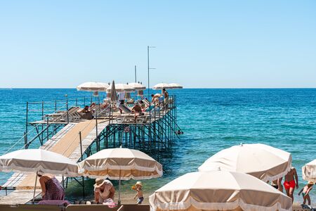 CANNES, FRANCE - JUNE 01, 2019: People On Cannes City Beach At The Mediterranean Seaのeditorial素材