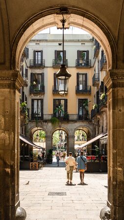 BARCELONA, SPAIN - JUNE 03, 2019: People Heading Towards Royal Square (Placa Reial or Plaza Real) a Well-Known Tourist Attraction Of Barcelonaのeditorial素材