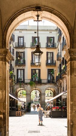 BARCELONA, SPAIN - JUNE 03, 2019: People Heading Towards Royal Square (Placa Reial or Plaza Real) a Well-Known Tourist Attraction Of Barcelonaのeditorial素材