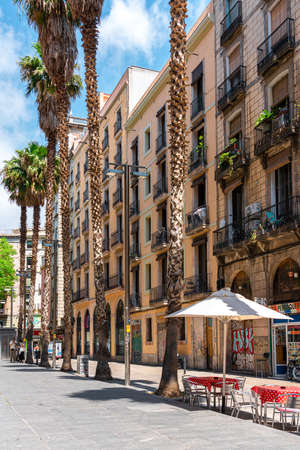 BARCELONA, SPAIN - JUNE 06, 2019: Exotic Architecture And Tropical Street Palm Trees Downtown Barcelona Cityのeditorial素材