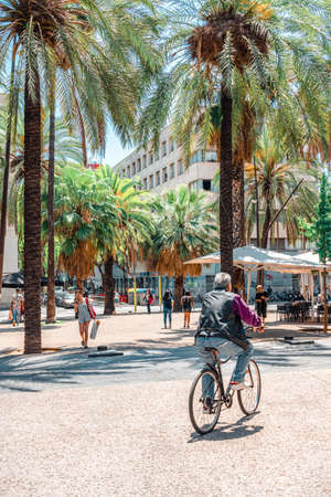 BARCELONA, SPAIN - JUNE 06, 2019: Exotic Architecture And Tropical Street Palm Trees Downtown Barcelona Cityのeditorial素材