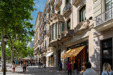 BARCELONA, SPAIN - JUNE 06, 2019: People and tourists walking on one of the most important avenues in downtown Barcelona cityのeditorial素材