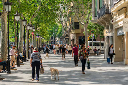 BARCELONA, SPAIN - JUNE 06, 2019: People and tourists walking on one of the most important avenues in downtown Barcelona cityのeditorial素材