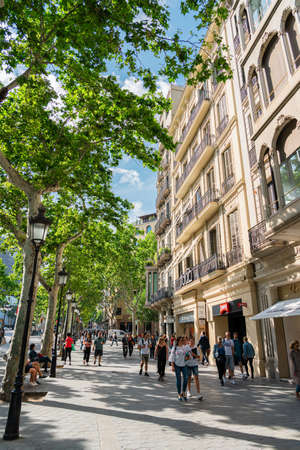 BARCELONA, SPAIN - JUNE 06, 2019: People and tourists walking on one of the most important avenues in downtown Barcelona cityのeditorial素材