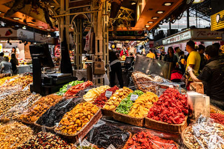 BARCELONA, SPAIN - JUNE 06, 2019: Healthy Fresh And Dried Fruits And Spices For Sale In Fruit Market La Boqueriaのeditorial素材