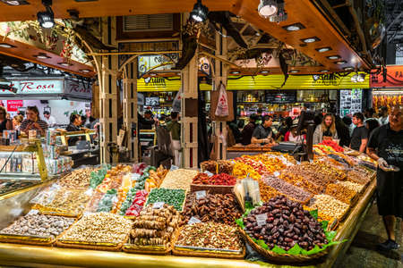 BARCELONA, SPAIN - JUNE 06, 2019: Healthy Fresh And Dried Fruits And Spices For Sale In Fruit Market La Boqueriaのeditorial素材