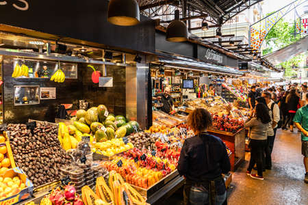 BARCELONA, SPAIN - JUNE 06, 2019: Healthy Fresh And Dried Fruits And Spices For Sale In Fruit Market La Boqueriaのeditorial素材