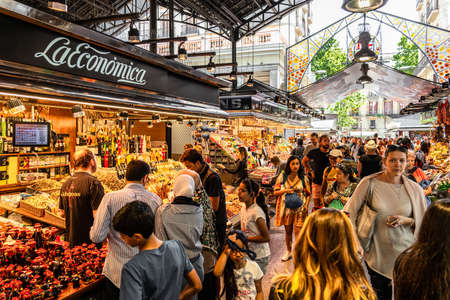 BARCELONA, SPAIN - JUNE 06, 2019: Healthy Fresh And Dried Fruits And Spices For Sale In Fruit Market La Boqueriaのeditorial素材