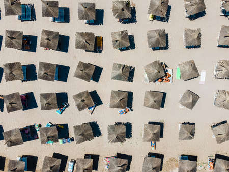 Aerial Beach, People And Umbrellas On Beach Photographyの写真素材