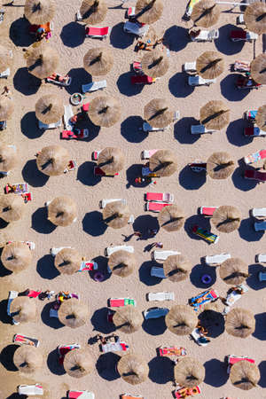 Aerial Beach, People And Umbrellas On Beach Photographyの写真素材
