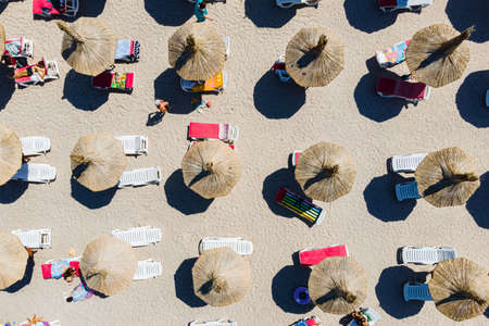 Aerial Beach, People And Umbrellas On Beach Photographyの写真素材
