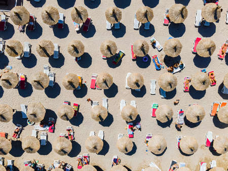Aerial Beach, People And Umbrellas On Beach Photographyの写真素材