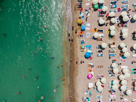 Aerial Beach Drone Photography, People And Umbrellas On Sea Beachの写真素材
