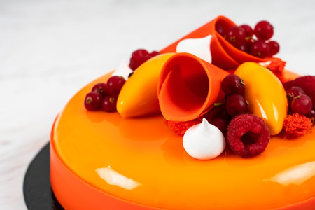 Orange, Mango and Raspberry Fruit Anniversary Birthday Cakeの写真素材