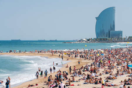 BARCELONA, SPAIN - JUNE 08, 2019: People Enjoying Summer On The Beachのeditorial素材