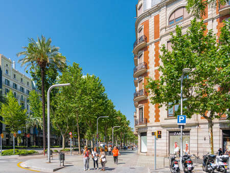 BARCELONA, SPAIN - JUNE 08, 2019: People Enjoying Everyday Life In Downtown Barcelona City, On Some...