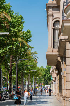 BARCELONA, SPAIN - JUNE 08, 2019: People Enjoying Everyday Life In Downtown Barcelona City, On Some...