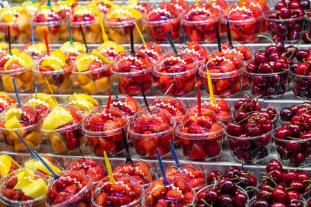 Fresh Red Strawberries And Cherries For Sale In Fruit Marketの写真素材