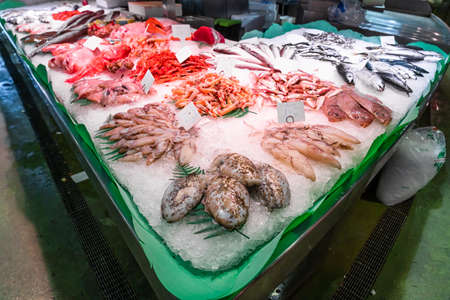 BARCELONA, SPAIN - JUNE 14, 2019: Fresh Fish And Seafood On Ice In Fish Marketのeditorial素材