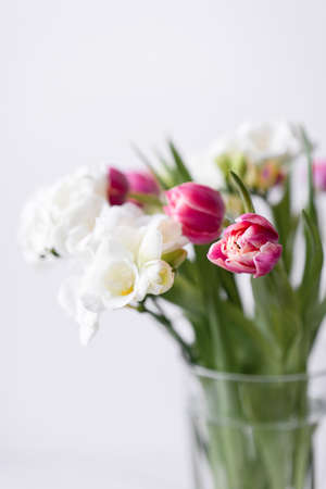 Pink Tulips Flowers Bouquet on a Light Backgroundの写真素材