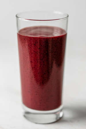 Healthy Detox Blueberries and Blackberries Smoothie Glassの写真素材